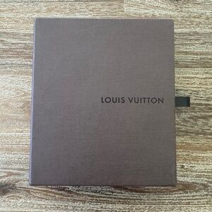 Empty authentic Louis Vuitton box with dust cover. Pristine condition